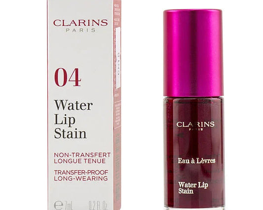 Clarins Paris Water Lip Stain shade 04 next to its packaging box. The lip stain bottle has a metallic magenta cap and a deep burgundy liquid inside, shown next to its white and pink box on a white background.